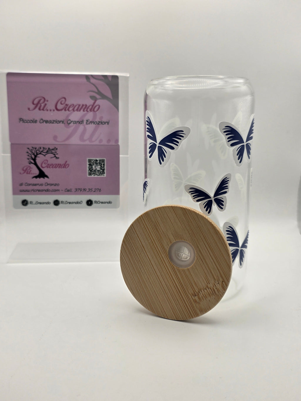 Glass cup with butterflies