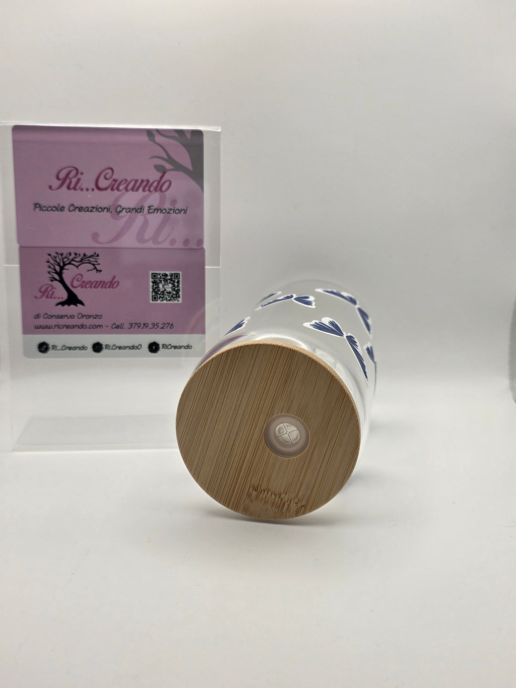 Glass cup with butterflies